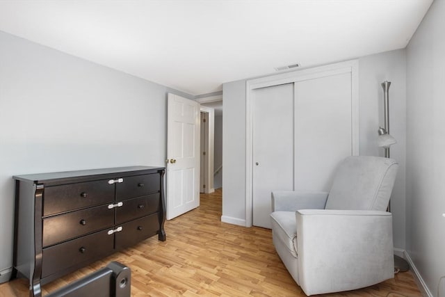 7 Cornish St, Carver, MA 02330 - sitting room featuring light wood-style flooring and baseboards