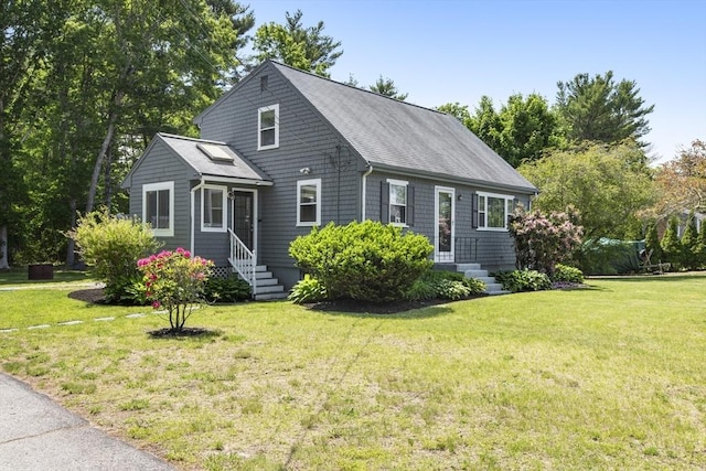 7 Cornish St, Carver, MA 02330 - view of front facade with a front lawn, a shingled roof, and entry steps