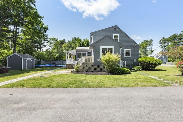 7 Cornish St, Carver, MA 02330 - view of front of property featuring a front yard and a sunroom