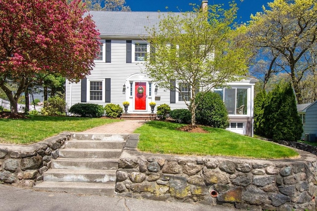 colonial house with a front lawn