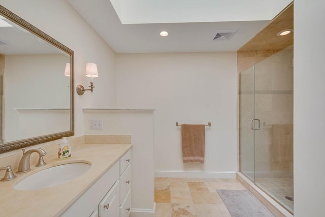 full bathroom featuring recessed lighting, visible vents, a stall shower, vanity, and baseboards