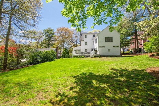 view of yard featuring a wooden deck