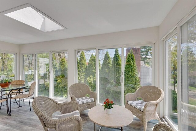 sunroom / solarium with a skylight