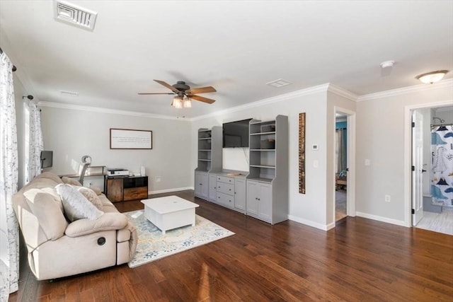 living room featuring dark wood-type flooring, crown molding, and ceiling fan