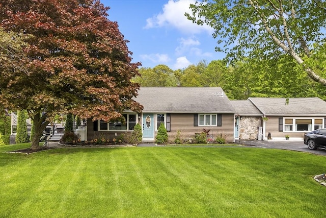 8 New Spencer Rd, Charlton, MA 01507 - view of front facade with a garage, a front lawn, and driveway