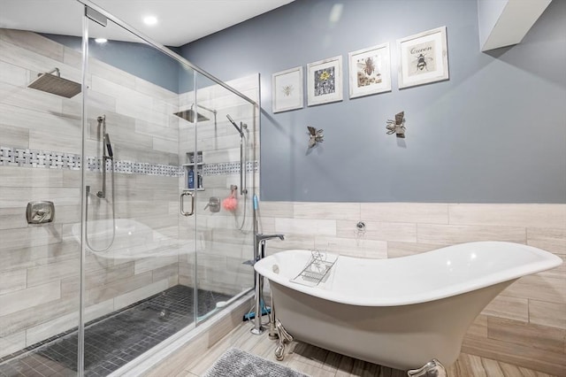 8 New Spencer Rd, Charlton, MA 01507 - full bath with a stall shower, a freestanding tub, tile walls, wainscoting, and recessed lighting