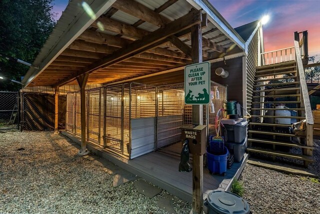 8 New Spencer Rd, Charlton, MA 01507 - outdoor structure at dusk with stairway and an exterior structure