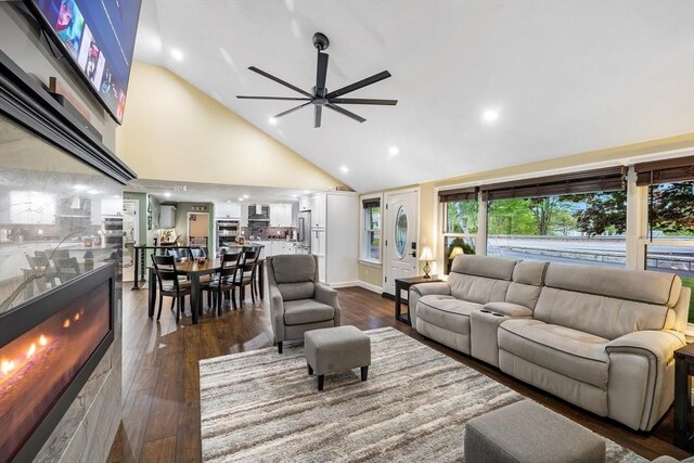 8 New Spencer Rd, Charlton, MA 01507 - living room featuring ceiling fan, high vaulted ceiling, dark wood finished floors, and recessed lighting