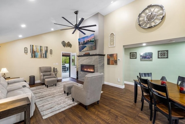 8 New Spencer Rd, Charlton, MA 01507 - living area with high vaulted ceiling, baseboards, a premium fireplace, dark wood-style floors, and ceiling fan
