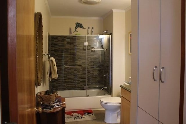 bathroom featuring crown molding, bathtub / shower combination, and toilet