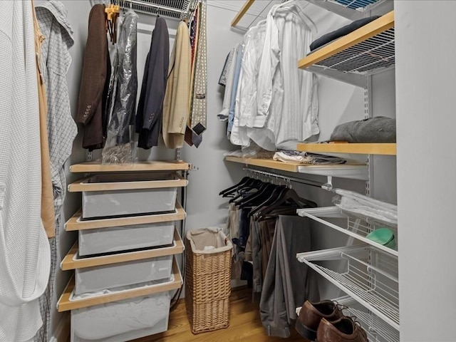 1 Auburn Ct Unit 1, Brookline, MA 02446 - walk in closet featuring wood finished floors