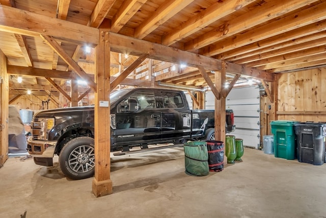 garage with wood walls