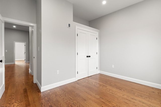 unfurnished bedroom featuring hardwood / wood-style floors