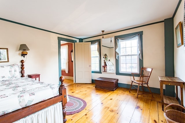 bedroom with light wood-type flooring