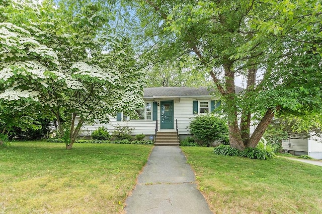 890 Westford St, Lowell, MA 01850 - view of front of property with a front yard