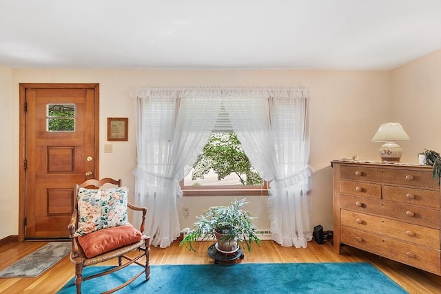 890 Westford St, Lowell, MA 01850 - sitting room featuring wood finished floors