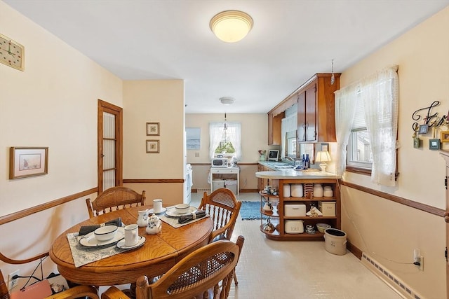 890 Westford St, Lowell, MA 01850 - dining space with baseboards