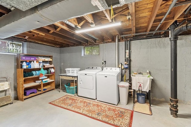 890 Westford St, Lowell, MA 01850 - below grade area featuring washing machine and clothes dryer and a sink