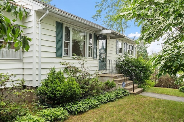 890 Westford St, Lowell, MA 01850 - view of front of home featuring a front yard