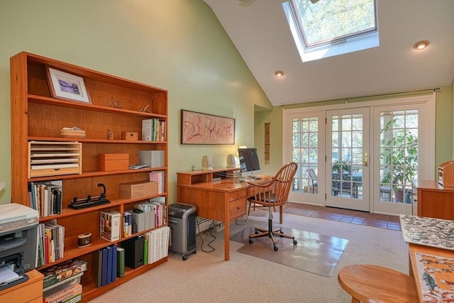 carpeted office featuring recessed lighting, a skylight, and high vaulted ceiling
