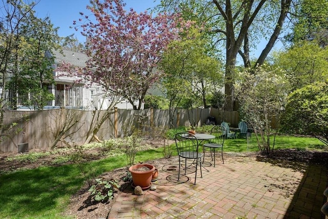 view of patio / terrace featuring fence