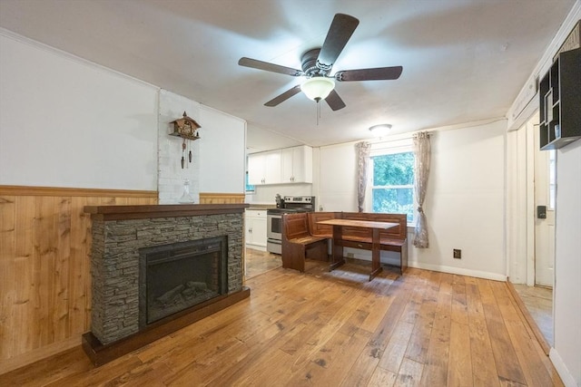 170 Walnut Rd, Wrentham, MA 02093 - living room with a ceiling fan, light wood-type flooring, and a stone fireplace