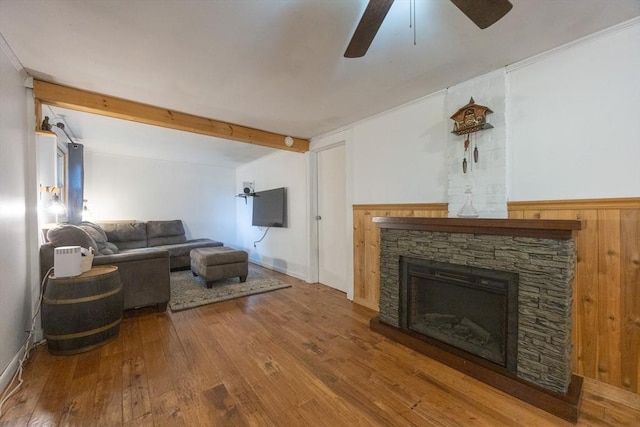170 Walnut Rd, Wrentham, MA 02093 - living area with a ceiling fan, wood-type flooring, a fireplace, and beam ceiling