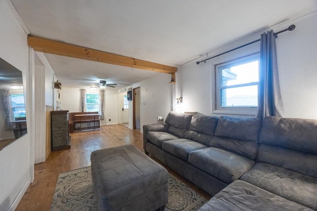 170 Walnut Rd, Wrentham, MA 02093 - living area with light wood-style flooring, a ceiling fan, and beam ceiling