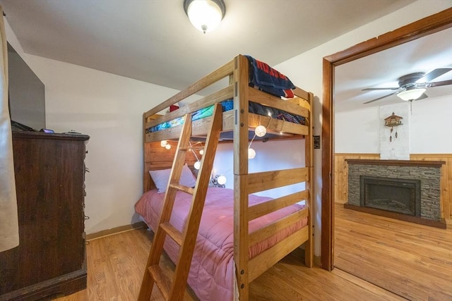 170 Walnut Rd, Wrentham, MA 02093 - bedroom featuring wood finished floors and a fireplace