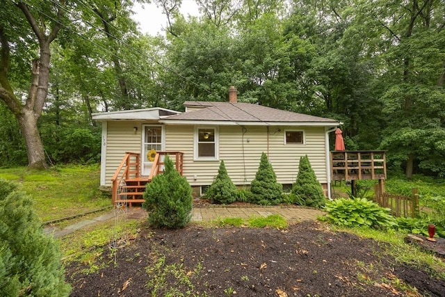170 Walnut Rd, Wrentham, MA 02093 - back of house with a chimney and roof with shingles