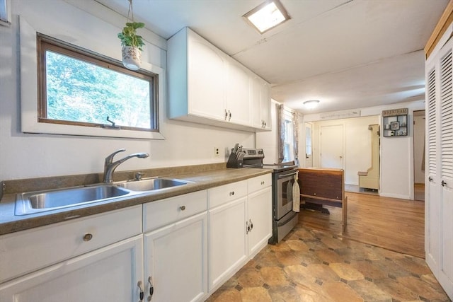 170 Walnut Rd, Wrentham, MA 02093 - kitchen featuring stainless steel range with electric stovetop and white cabinets