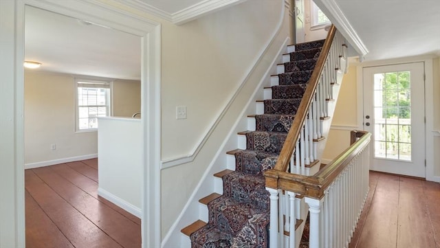 141 State St Unit 2, Newburyport, MA 01950 - staircase featuring hardwood / wood-style flooring, plenty of natural light, baseboards, and crown molding