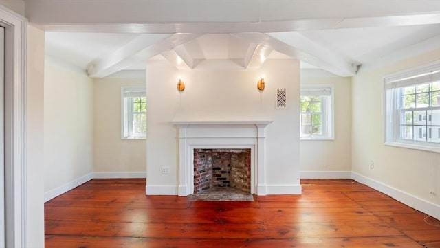 141 State St Unit 2, Newburyport, MA 01950 - unfurnished living room with beam ceiling, hardwood / wood-style flooring, plenty of natural light, and a fireplace with flush hearth