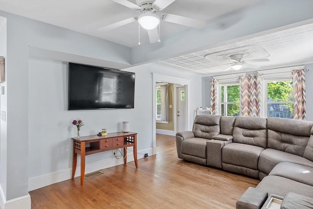 37 Gorham St, Chelmsford, MA 01824 - living room with ceiling fan, light wood-style flooring, and baseboards