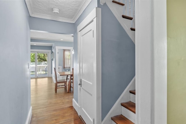 37 Gorham St, Chelmsford, MA 01824 - hall with wood finished floors, an ornate ceiling, stairs, and baseboards