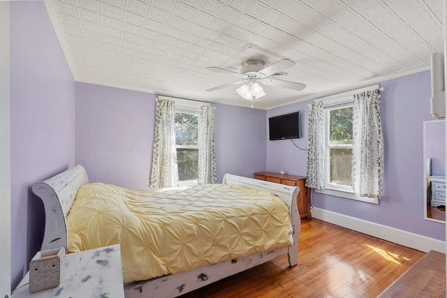 37 Gorham St, Chelmsford, MA 01824 - bedroom with hardwood / wood-style flooring, baseboards, and ceiling fan