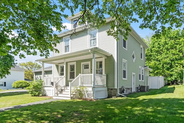 37 Gorham St, Chelmsford, MA 01824 - traditional style home with covered porch, central air condition unit, and a front yard