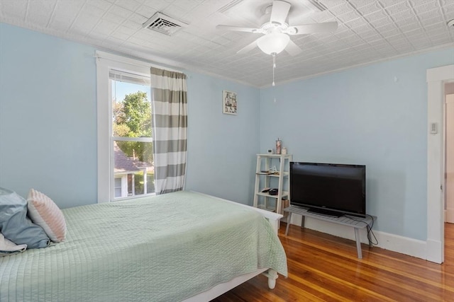 37 Gorham St, Chelmsford, MA 01824 - bedroom featuring wood finished floors, a ceiling fan, and baseboards