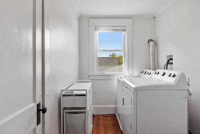 37 Gorham St, Chelmsford, MA 01824 - laundry area with washer and clothes dryer, dark wood-type flooring, crown molding, and baseboards