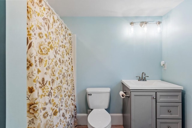 37 Gorham St, Chelmsford, MA 01824 - full bath with toilet, vanity, a shower with curtain, and baseboards