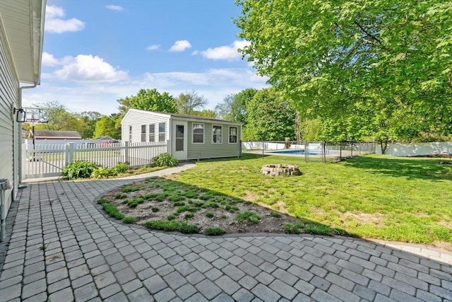 37 Gorham St, Chelmsford, MA 01824 - view of yard with a gate, an outdoor structure, and a patio