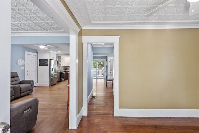 37 Gorham St, Chelmsford, MA 01824 - hallway featuring an ornate ceiling, crown molding, baseboards, and wood finished floors
