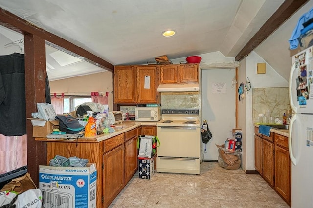 7 Prospect St, Woburn, MA 01801 - kitchen featuring white appliances, under cabinet range hood, light countertops, and brown cabinets