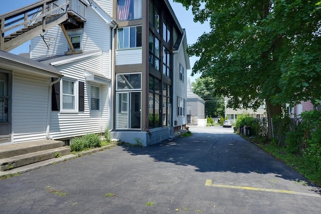 7 Prospect St, Woburn, MA 01801 - view of side of property with asphalt driveway