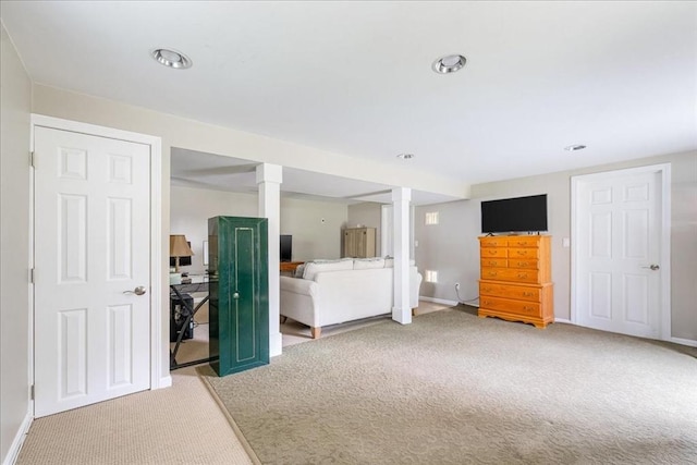 bedroom featuring recessed lighting, baseboards, decorative columns, and carpet