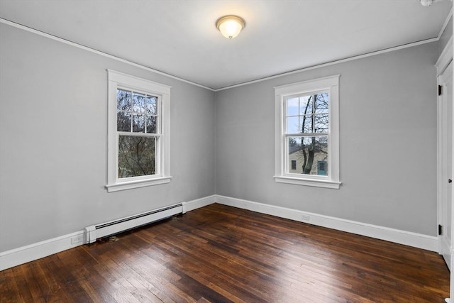 spare room with crown molding, a baseboard radiator, and dark hardwood / wood-style floors