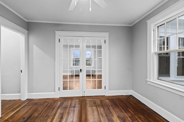 unfurnished room featuring ornamental molding, dark wood-type flooring, radiator, and french doors