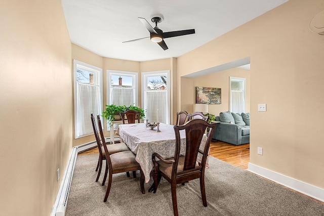 dining room featuring ceiling fan and light wood-type flooring