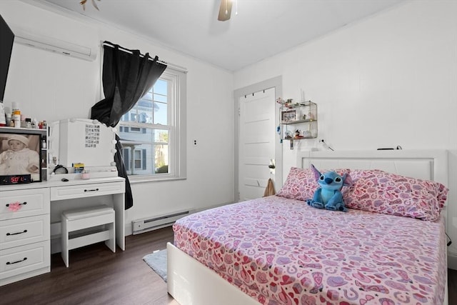 73 Lincoln Ave, Saugus, MA 01906 - bedroom featuring a baseboard heating unit, dark wood-style flooring, a wall mounted air conditioner, and a ceiling fan