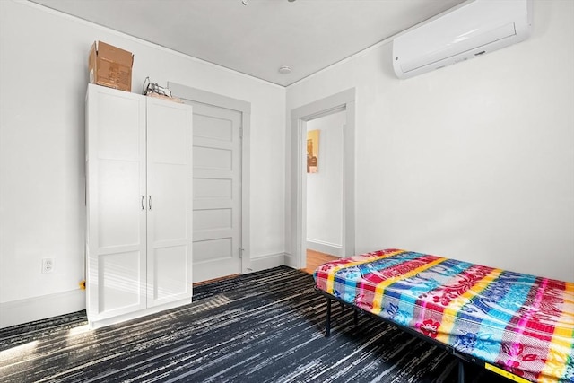 73 Lincoln Ave, Saugus, MA 01906 - bedroom featuring a wall mounted AC and baseboards